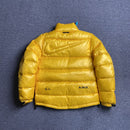 Jaqueta Puffer Nike x NOCTA Sunset Yellow