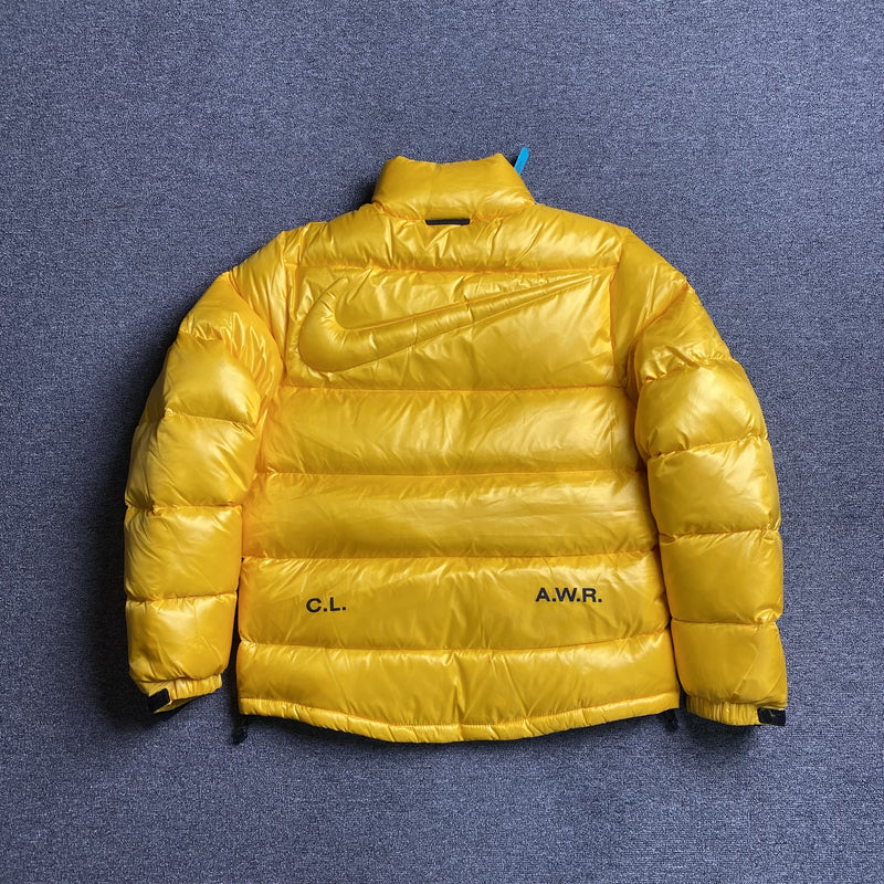 Jaqueta Puffer Nike x NOCTA Sunset Yellow