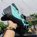 Air Jordan 13 Retro Black Island Green